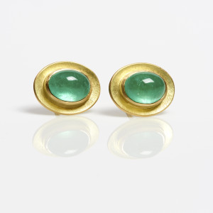 18 carat gold oval earstuds with cabochon emeralds