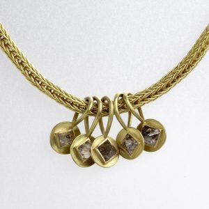 18 carat gold loop-in-loop chain with five detachable gold pendants with natural octahedral diamonds 18 carat gold loop-in-loop chain with five detachable gold pendants with natural octahedral diamonds