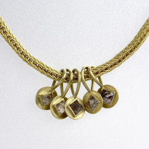 18 carat gold loop-in-loop chain with five detachable gold pendants with natural octahedral diamonds 18 carat gold loop-in-loop chain with five detachable gold pendants with natural octahedral diamonds