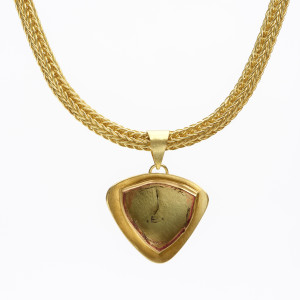 18 carat gold pendant with watermelon tourmaline slice on 18 carat gold loop-in-loop necklace