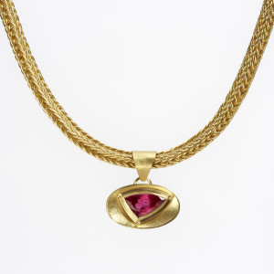 18 carat gold pendant with rubellite tourmaline on 18 carat gold loop-in-loop necklace