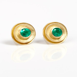 18 carat gold double oval earstuds with facetted oval emeralds