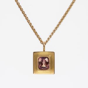 18 carat rose gold pendant set with a cushion-cut lavender pink padparadascha facetted sapphire 18 carat rose gold pendant set with a cushion-cut lavender pink padparadascha facetted sapphire