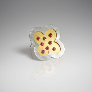 Quatrefoil silver and 24 carat gold brooch with spinel beads
