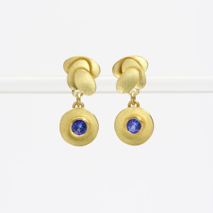 18 carat gold triple oval earstuds with round drop with facetted tanzanites