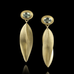 18 carat gold oval earstuds with facetted green tourmalines and long tapered twisted drops