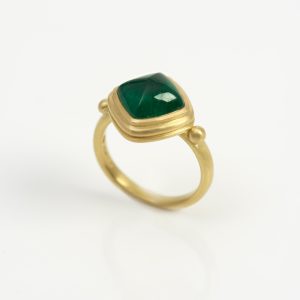 18 carat gold ring with vaulted four sided emerald set in 22 carat gold 18 carat gold ring with vaulted four sided emerald set in 22 carat gold